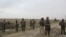 Afghan National Army (ANA) soldiers arrive at the site of last night clashes between Taliban and Afghan forces in Kunduz, Afghanistan, March 4, 2020. 