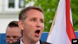 FILE - In this May 18, 2016 file picture the head of the Alternative for Germany party, AfD, in Thuringia, Bjoern Hoecke, speaks during a rally in Erfurt, eastern Germany.