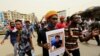 Sudanese take part in a march against the Rapid Support Forces, whom they blame for a raid on protesters who had camped outside the defense ministry during the 2019 revolution, in Khartoum, Sudan, June 3, 2021. 