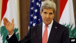 U.S. Secretary of State John Kerry speaks during a press conference after his meeting with Lebanese Prime Minister Tamam Salam, at the government palace, in Beirut, Lebanon, June 4, 2014.