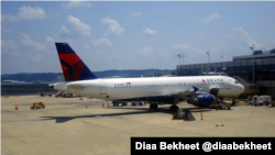 A Delta Air Lines jet is parked at Reagan National Airport in Washington, DC. (Photo: Diaa Bekheet)