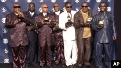 FILE - The Blind Boys Of Alabama hold Grammys for Best Traditional Soul Gospel Album at the 45th Annual Grammy Awards, Feb. 23, 2003, in New York. 