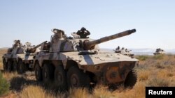 FILE - Soldiers from 22 African nations join exercises as part of the African Union's African Standby Force at the South Africa National Defense Force's Lohatla training area, Oct. 28, 2015.