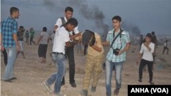 Kurdên her du alîyên sînor êrîşên ser Kobanê protesto dikin