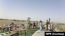 Dîmenek ji qada qezaya trenê ya li Pakistanê