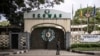 FILE - A local resident walks past the Economic Community of West African States (ECOWAS) office in Lagos, Nigeria, Sept. 24, 2024.