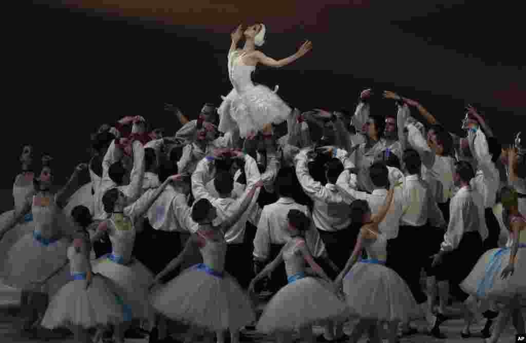 Artists perform during the closing ceremony of the 2014 Winter Olympics, Feb. 23, 2014.