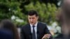 Ukrainian President Volodymyr Zelenskiy gestures during an open-air news conference, one year after his inauguration, amid the outbreak of the coronavirus disease in Kyiv, May 20, 2020.