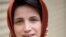 Iranian human rights activist Nasrin Sotoudeh ended a 49-day hunger strike Tuesday after authorities lifted a travel ban on her daughter.