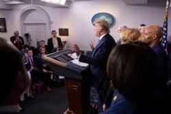 President Donald Trump speaks during a briefing about the coronavirus in the James Brady Press Briefing Room of the White House, March 15, 2020, in Washington.
