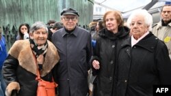 FILE —French Holocaust survivor Ginette Kolinka (L), French lawyer and activist Serge Klarsfeld (CL), French-German journalist Beate Klarsfeld (CR) and French Holocaust survivor Esther Senot (R) pose at the Memorial de la Shoah Holocaust museum in Paris on November 18, 2023.