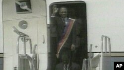 Jean-Bertrand Aristide returning to Haiti in 1994 after being ousted from power