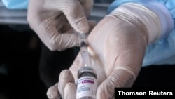 Healthcare worker prepares AstraZeneca COVID-19 vaccine in Sidoarjo near Surabaya, March 22, 2021.