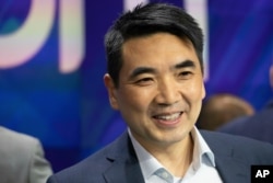 Zoom CEO Eric Yuan attends the opening bell at Nasdaq as his company holds its IPO, April 18, 2019, in New York.