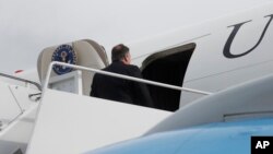 FILE - U.S. Secretary of State Mike Pompeo enters his plane to depart on a trip, at Andrews Air Force Base, Maryland, Oct. 15, 2018.