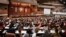 FILE - In this April 19, 2018 file photo, legislators ratify the election of Cuba's new president Miguel Diaz-Canel at the National Assembly in Havana, Cuba.
