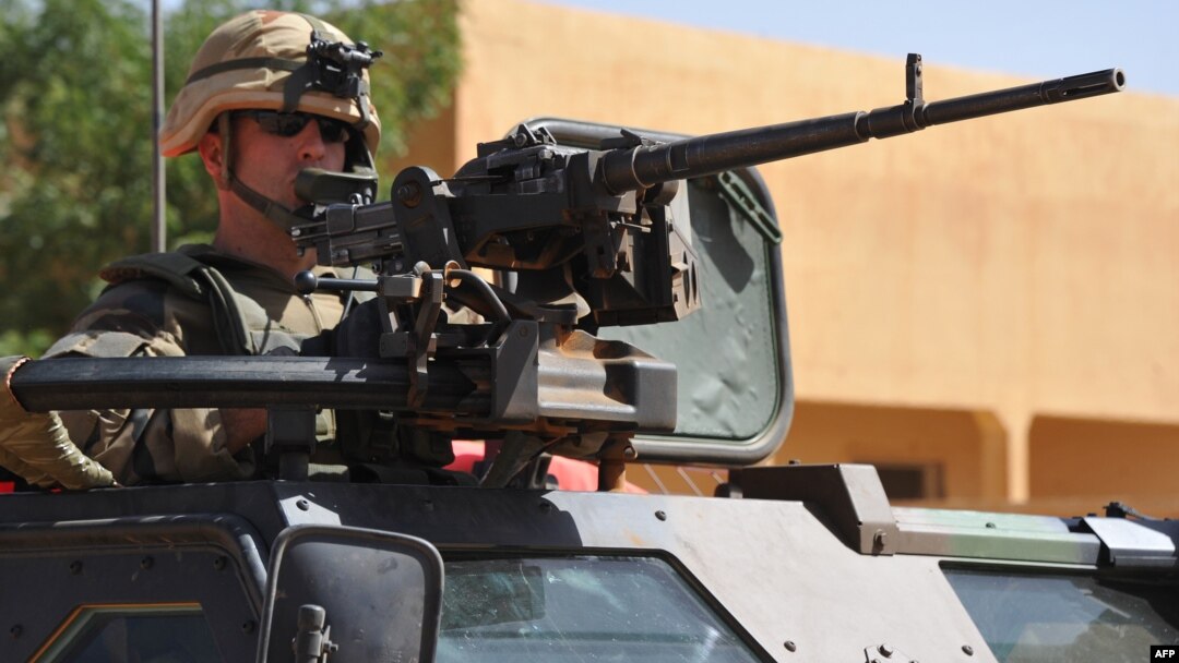 French troops patrol in the streets of Gao on February 3, 2013 as France jets carried out major air strikes today near Kidal.