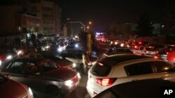 FILE - Vehicles are stuck in a traffic jam in Tehran, Dec. 21, 2017, after a magnitude 5.2 earthquake jolted a town near Iran's capital hours earlier. 