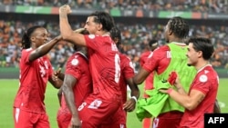 FILE — Equatorial Guinea's midfielder Jannick Buyla celebrates with teammates after scoring his team's fourth goal during the Africa Cup of Nations 2024 group A match against Ivory Coast in Ebimpe, Abidjan on Jan. 22, 2024. 