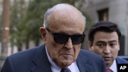 Former New York City Mayor Rudy Giuliani arrives at court to explain to a federal judge why he hasn't surrendered his valuables as part of a $148 million defamation judgment, in New York, Nov. 7, 2024.