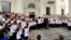Olympians applaud as President Donald Trump speaks, welcoming the Team USA Olympic athletes on North Portico at the White House in Washington, April 27, 2018.