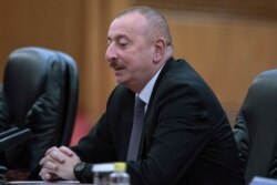 Azerbaijan President Ilham Aliyev meets with Chinese President Xi Jinping in Beijing, April 24, 2019.