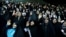 FILE - Veiled Iranian women attend a ceremony in support of the observance of the Islamic dress code for women, in Tehran, Iran, July 11, 2019. 