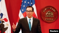 U.S. Treasury Secretary Steve Mnuchin speaks to the media next to Chile's Finance Minister Felipe Larrain (not pictured), during a meeting at La Moneda Presidential Palace in Santiago, Chile, March 21, 2018. 