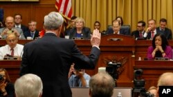 FILE - Former special counsel Robert Mueller is sworn in by House Judiciary Committee Chairman Jerrold Nadler, D-N.Y., to testify before the House Judiciary Committee hearing on his report on Russian election interference, on Capitol Hill, July 24, 2019. 
