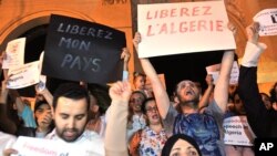 FILE: Algerian journalists and other intellectuals stage a protest against government crackdown in front of the national theater in Algiers, Algeria. July 1, 2016