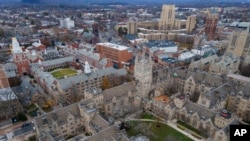 FILE - The Yale University campus is in New Haven, Connecticut, on Dec. 4, 2023. A group of colleges and universities - including Yale - have agreed to settle allegations of deceptive deceptive financial aid tactics, according to a report published in The Hill. 