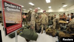 Los infantes de marines de la Compañía Fox, a su arribo al Aeropuerto de la Base Royal de la Fuerza Área Australiana en Darwin.