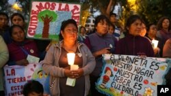Vigilia en la víspera de la inauguración de la Conferencia sobre Cambio Climático en Lima, Perú.