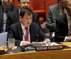 Russian Deputy Ambassador to the United Nations Dmitry Polyanskiy speaks during a security council meeting about the escalating tensions between the Ukraine and Russia at United Nations headquarters, Nov. 26, 2018.