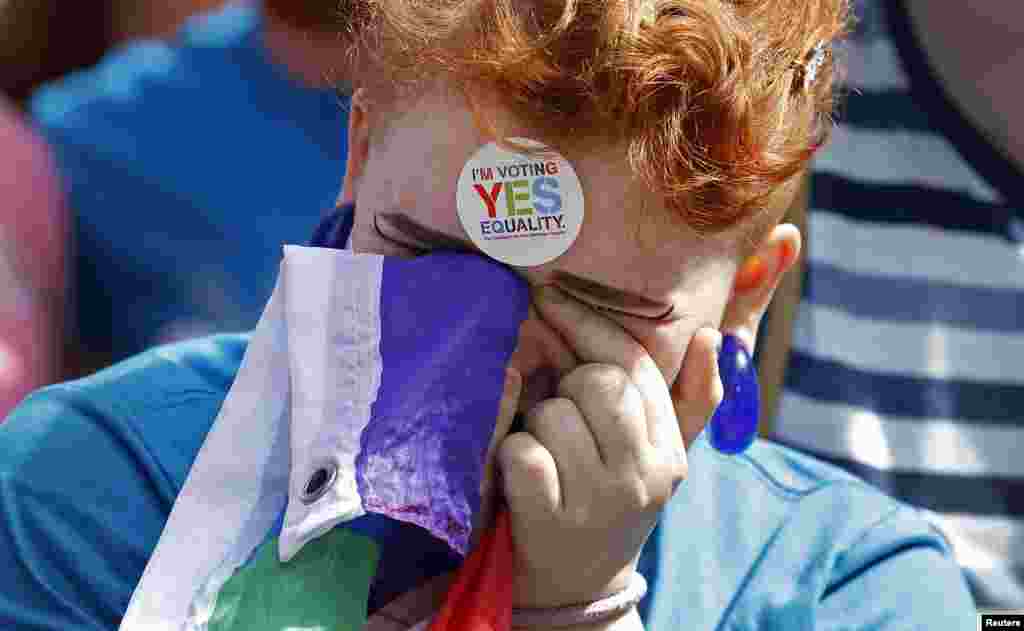 A same-sex marriage supporter reacts at Dublin Castle in Dublin, Ireland, May 23, 2015. 