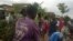 Les habitants des quartiers périphériques du centre-ville fuient après une attaque meurtrière à la machette, à Beni, Nord-Kivu, 15 août 2016.
