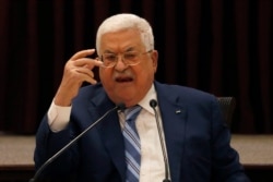 President Mahmoud Abbas gestures during a meeting with the Palestinian leadership to discuss the United Arab Emirates' deal with Israel to normalize relations, in Ramallah on Aug. 18, 2020.