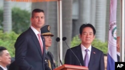 2026年5月8日，巴拉圭总统佩尼亚(左)在台北出席欢迎仪式并发表讲话，台湾总统赖清德陪同在侧。