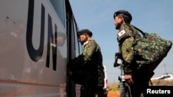 FILE - Japanese peacekeepers arrive at the Juba airport to participate in the United Nations Mission in South Sudan in South Sudan's capital Juba, Nov. 21, 2016.