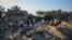 Warga Palestina melihat lokasi yang hancur akibat serangan udara Israel di kamp penampungan yang penuh sesak oleh warga Palestina yang mengungsi akibat perang di Muwasi, Jalur Gaza, Selasa, 10 September 2024. (Abdel Kareem Hana/AP)