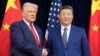 资料照片：唐纳德·特朗普总统与中国国家主席习近平在韩国釜山金海国际机场会晤前握手。(2025年10月30日)