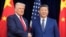 资料照片：美国总统唐纳德·特朗普与中国国家主席习近平2025年10月30日在韩国釜山会面前握手。