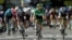 FILE - Cyclists are seen during stage 13 of the Tour de France, from Nimes to Carcassonne, France, July 9, 2021.