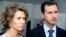 Suriya Prezidenti Bashar Assad (o'ngda) rafiqasi Asma Assad bilan, 2010-yil, 13-iyul.