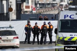 پلیس لیژ، پس از انفجار در کنیسه لیژ در منطقه حضور دارد