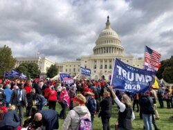 FILE - Supporters of President Donald Trump rally outside the U.S. Capitol in Washington to protest his impeachment inquiry, Oct. 17, 2019. (Diaa Bekheet/VOA)