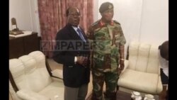 Zimbabwe President Shakes Hands with General Behind State Capture