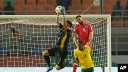 South Africa's goalkeeper Ronwen Williams, saves a shot during the African Cup of Nations Group E match againstcTunisia in Korhogo, Ivory Coast, Jan. 24, 2024.