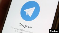 FILE - The Telegram logo is seen on a screen of a smartphone in this illustration, April 13, 2018.