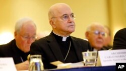 FILE - Archbishop Carlo Maria Vigano, Apostolic Nuncio to United States, listens to remarks at the United States Conference of Catholic Bishops' annual fall meeting in Baltimore, Maryland, Nov. 16, 2015.
